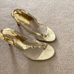 Gold Michael Kors sandals size 6 worn a few times 3 inch high heel